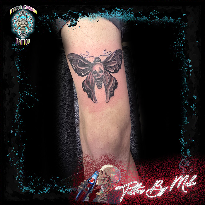 macon georgia tattoo - leg moth